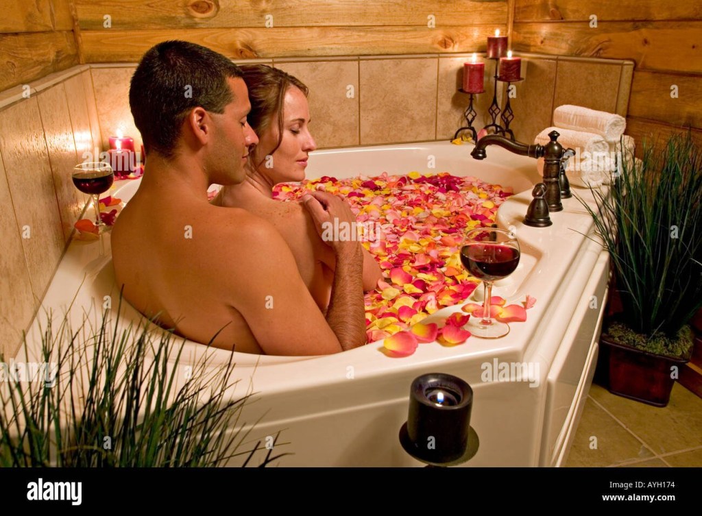 Boy and girl in a jacuzzi