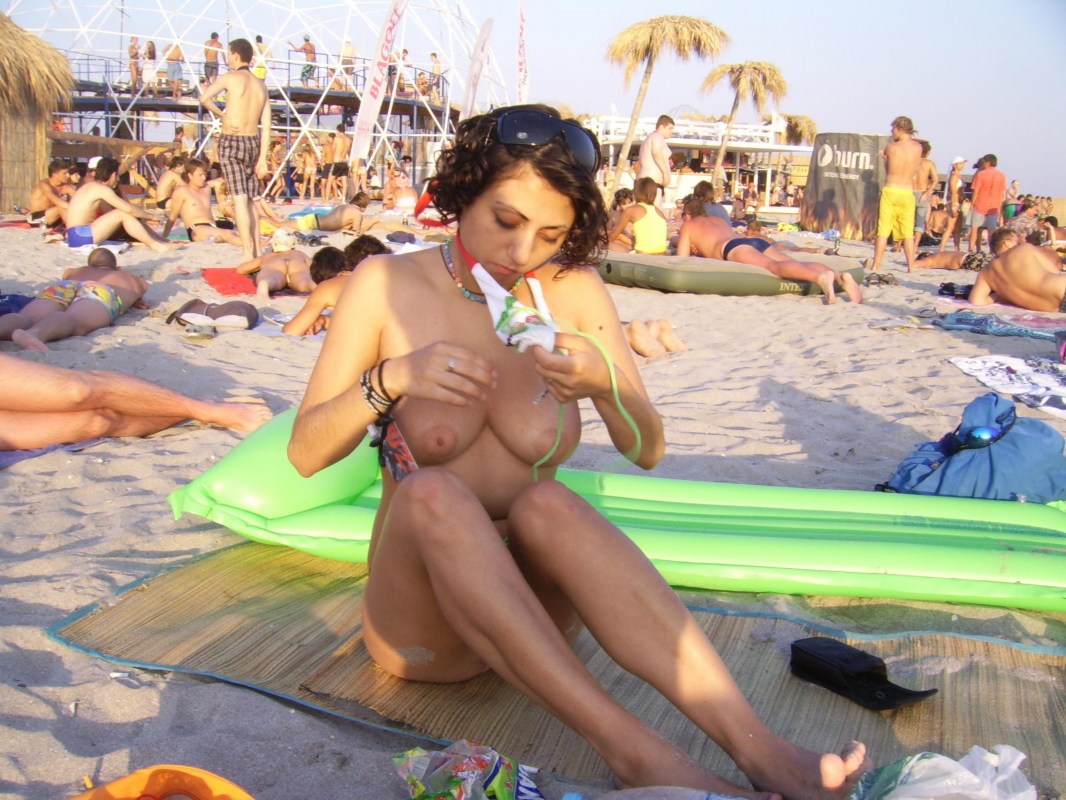 Big tits on a public beach