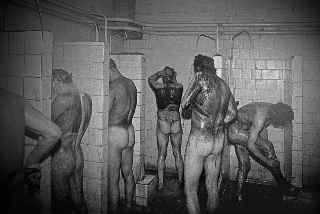 Naked miner in shower