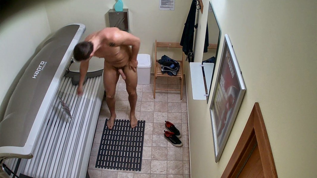 Hidden camera in solarium men