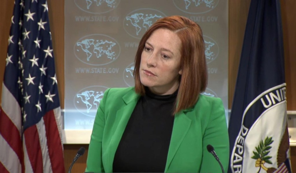 Jen Psaki in a short skirt