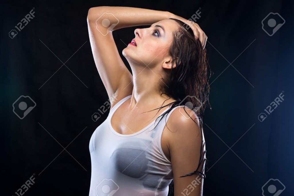 Girl in a white wet T -shirt