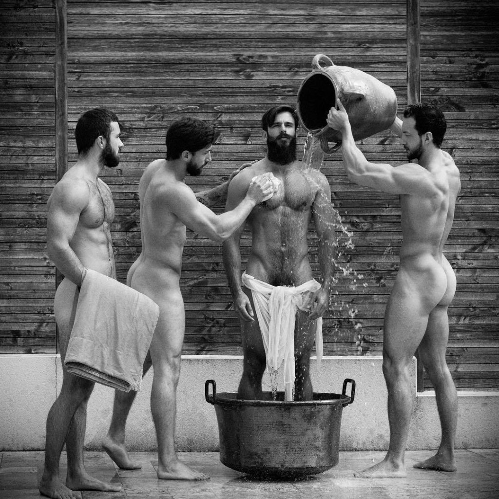 The guy washes a girl in the shower